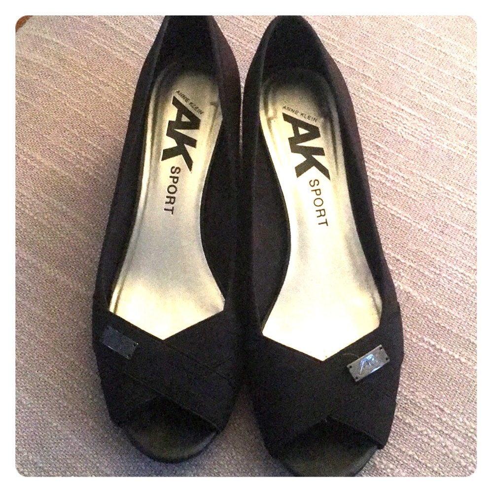 Opened toed low heels. Heel is about an inch